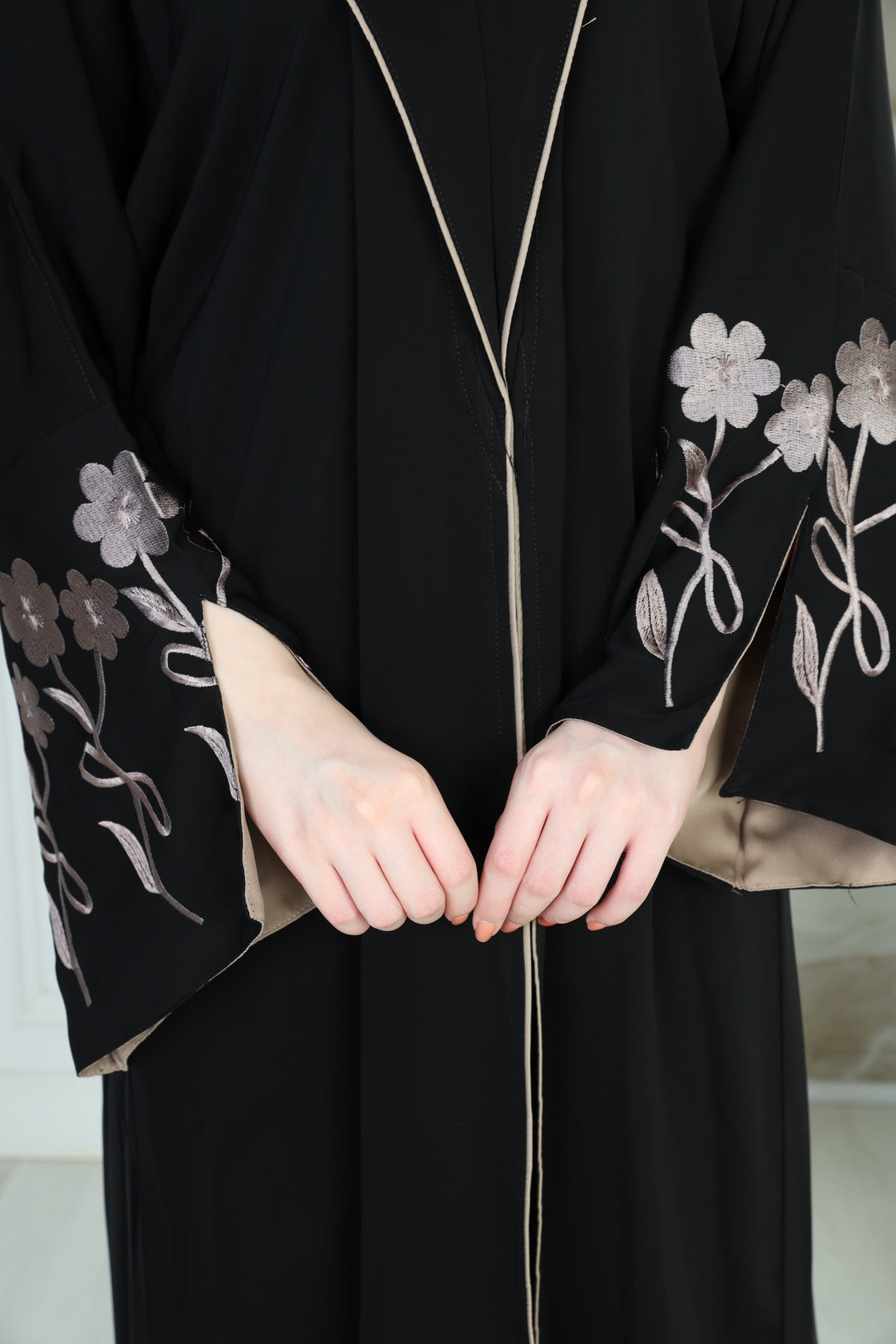 Black abaya with beige embroidery on the sleeves
