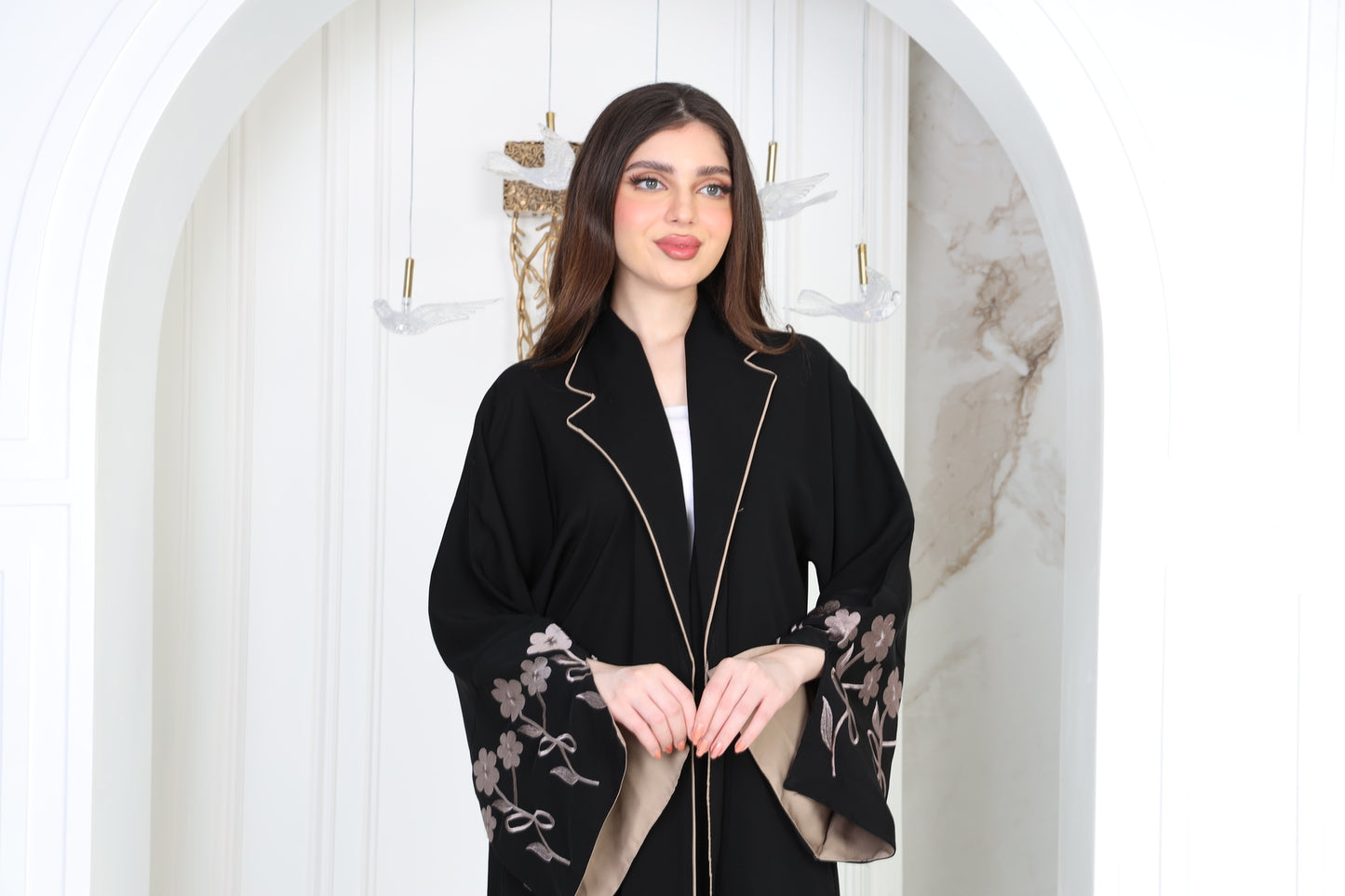 Black abaya with beige embroidery on the sleeves