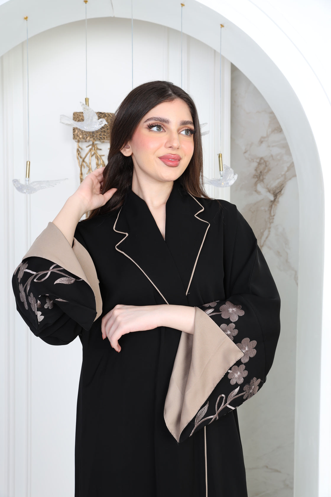 Black abaya with beige embroidery on the sleeves