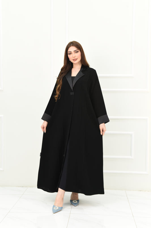 An elegant abaya with a rever collar and satin sleeves