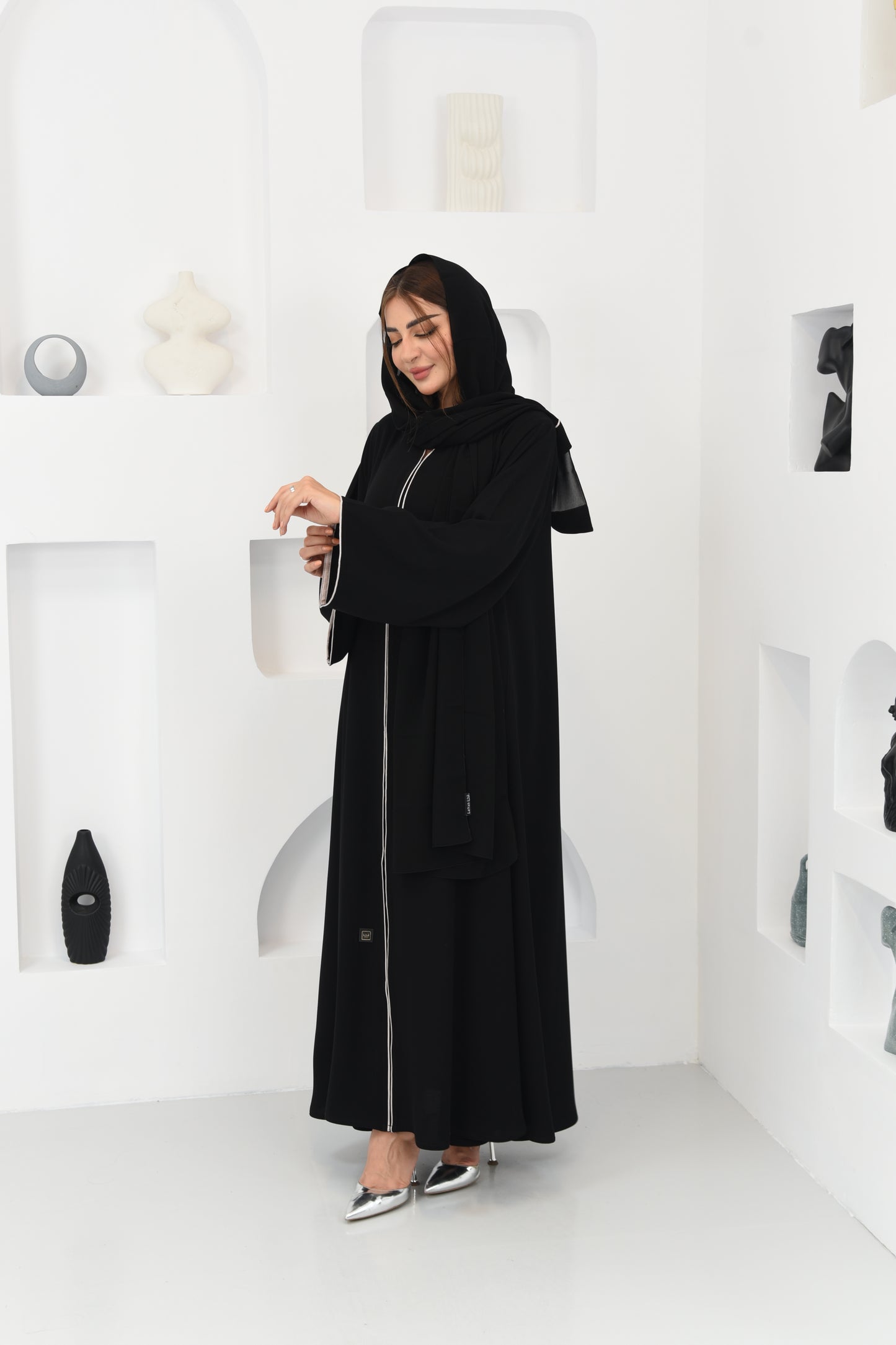 Flared abaya with elegant braided cord detailing