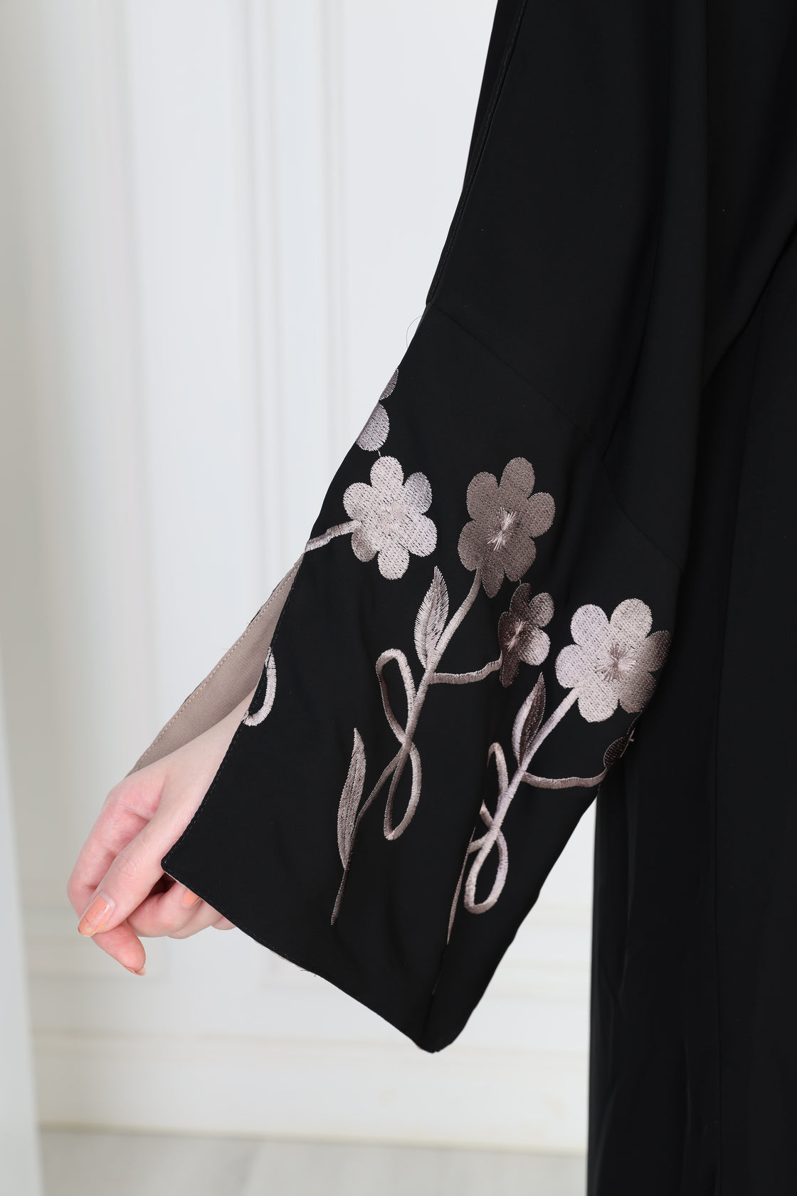 Black abaya with beige embroidery on the sleeves