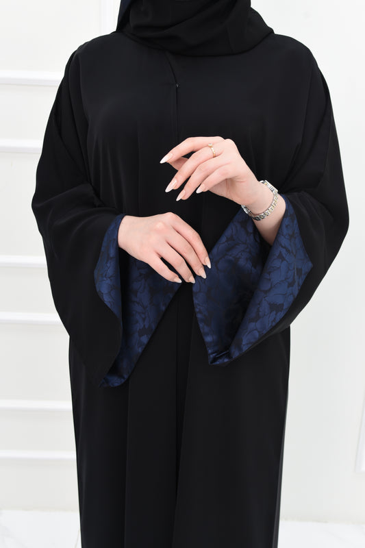 Black abaya with open sleeves lined with navy jacquard fabric
