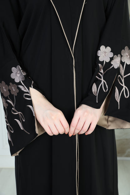 Black abaya with beige embroidery on the sleeves