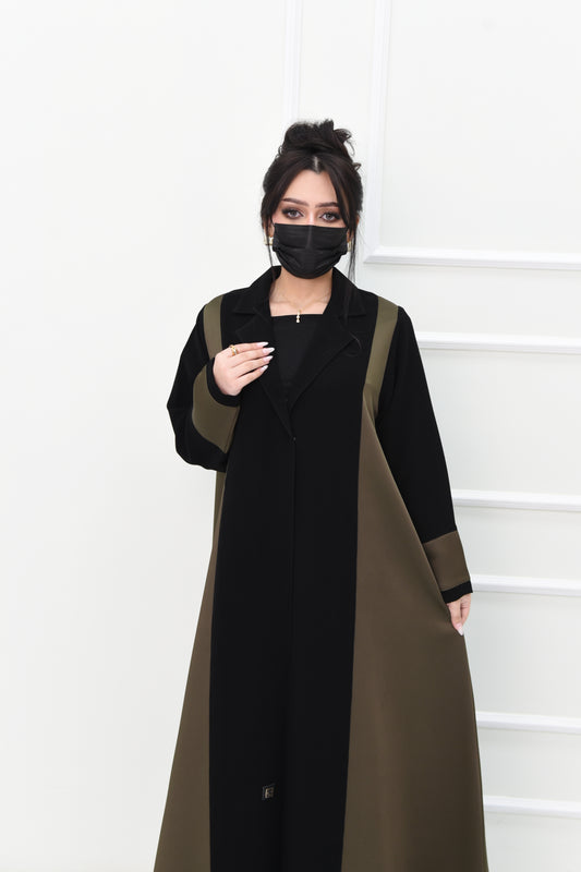 Abaya made from black fauxker fabric and olive taffeta, featuring a stylish rever collar
