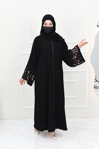 Black abaya adorned with delicate pink embroidery and accented with olive green trim