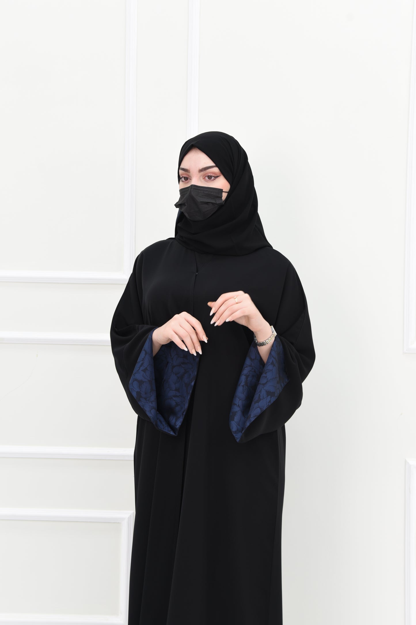 Black abaya with open sleeves lined with navy jacquard fabric
