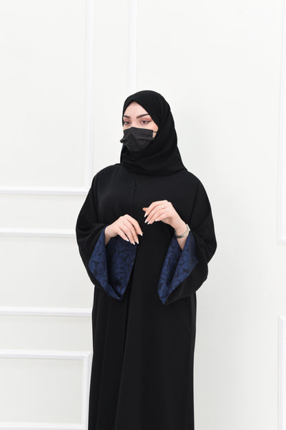 Black abaya with open sleeves lined with navy jacquard fabric