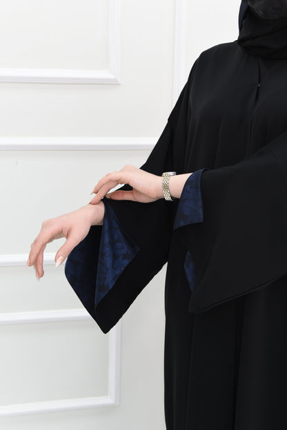 Black abaya with open sleeves lined with navy jacquard fabric