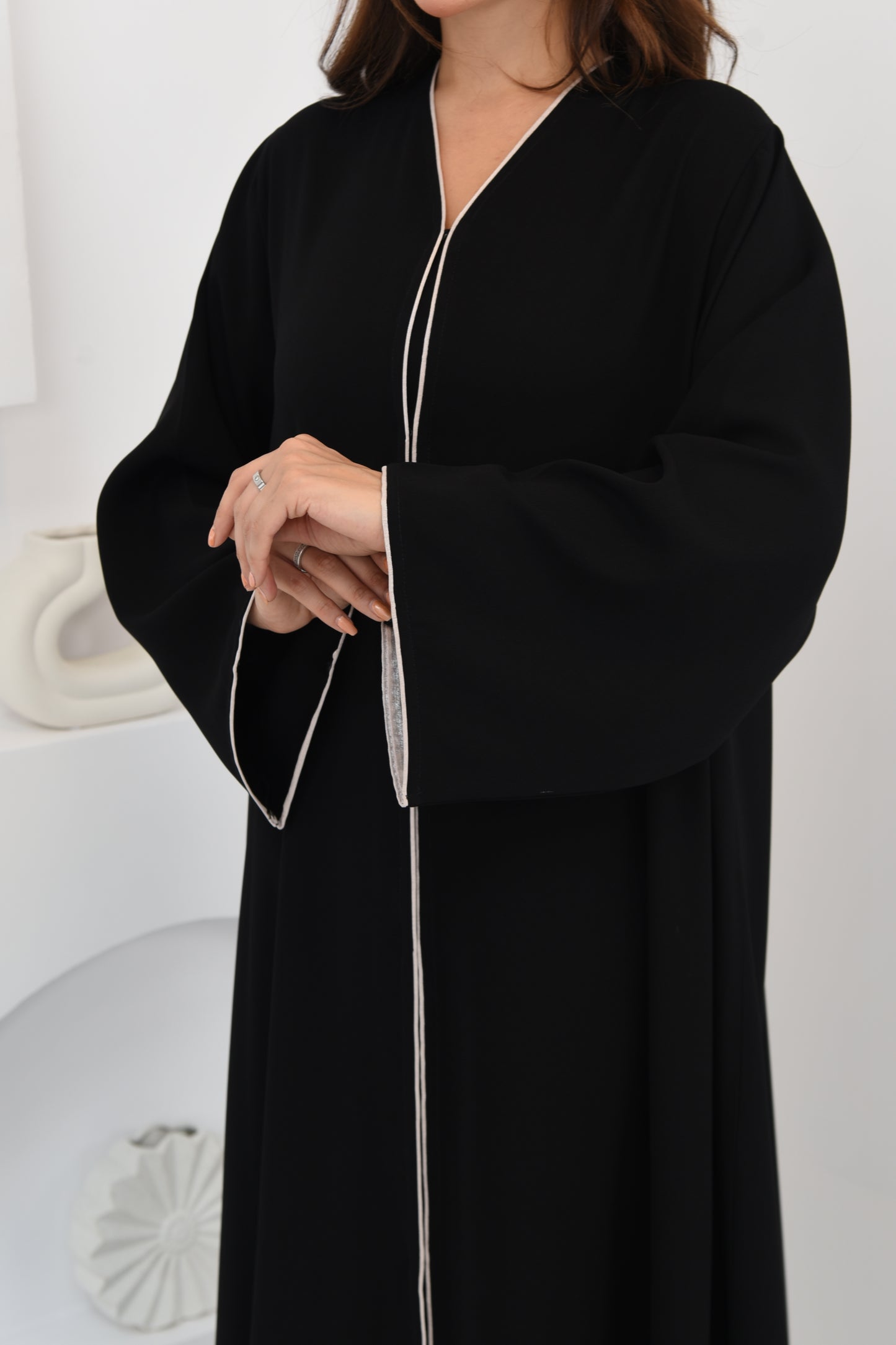 Flared abaya with elegant braided cord detailing