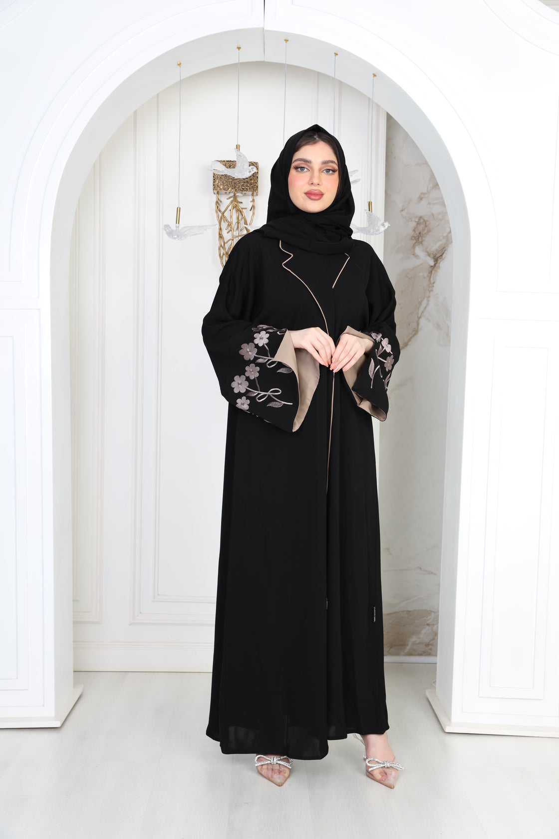 Black abaya with beige embroidery on the sleeves