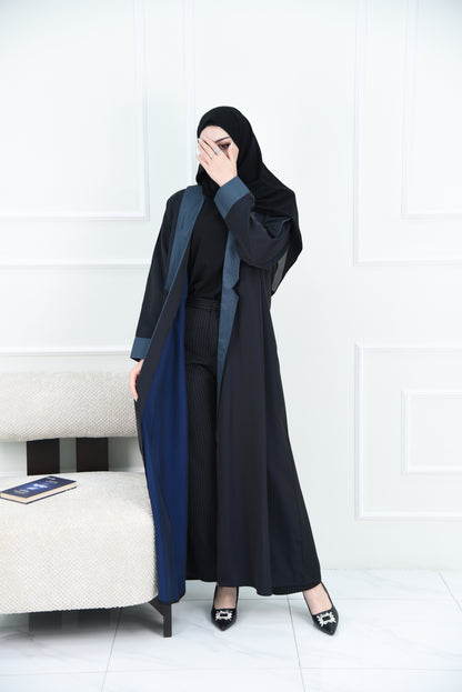A luxurious satin abaya with blue detailing