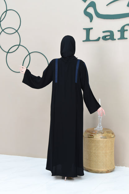 A pleated cloche abaya adorned with navy blue lace trim