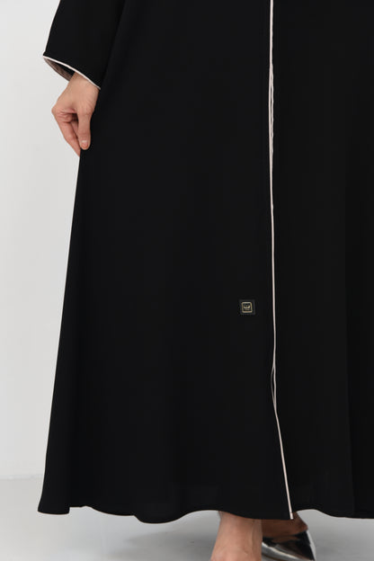 Flared abaya with elegant braided cord detailing