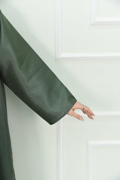 An elegant olive green abaya designed with an exquisite embroidery along the lower hem