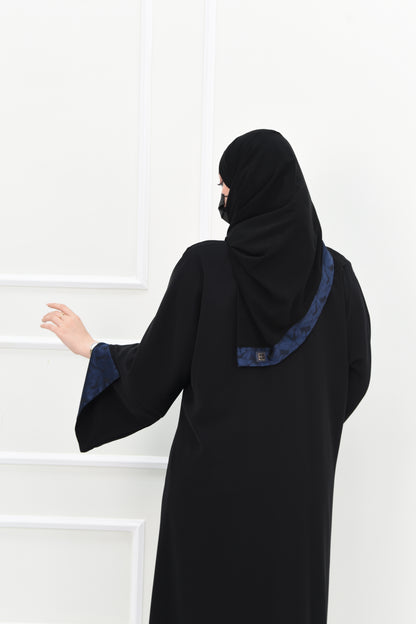 Black abaya with open sleeves lined with navy jacquard fabric